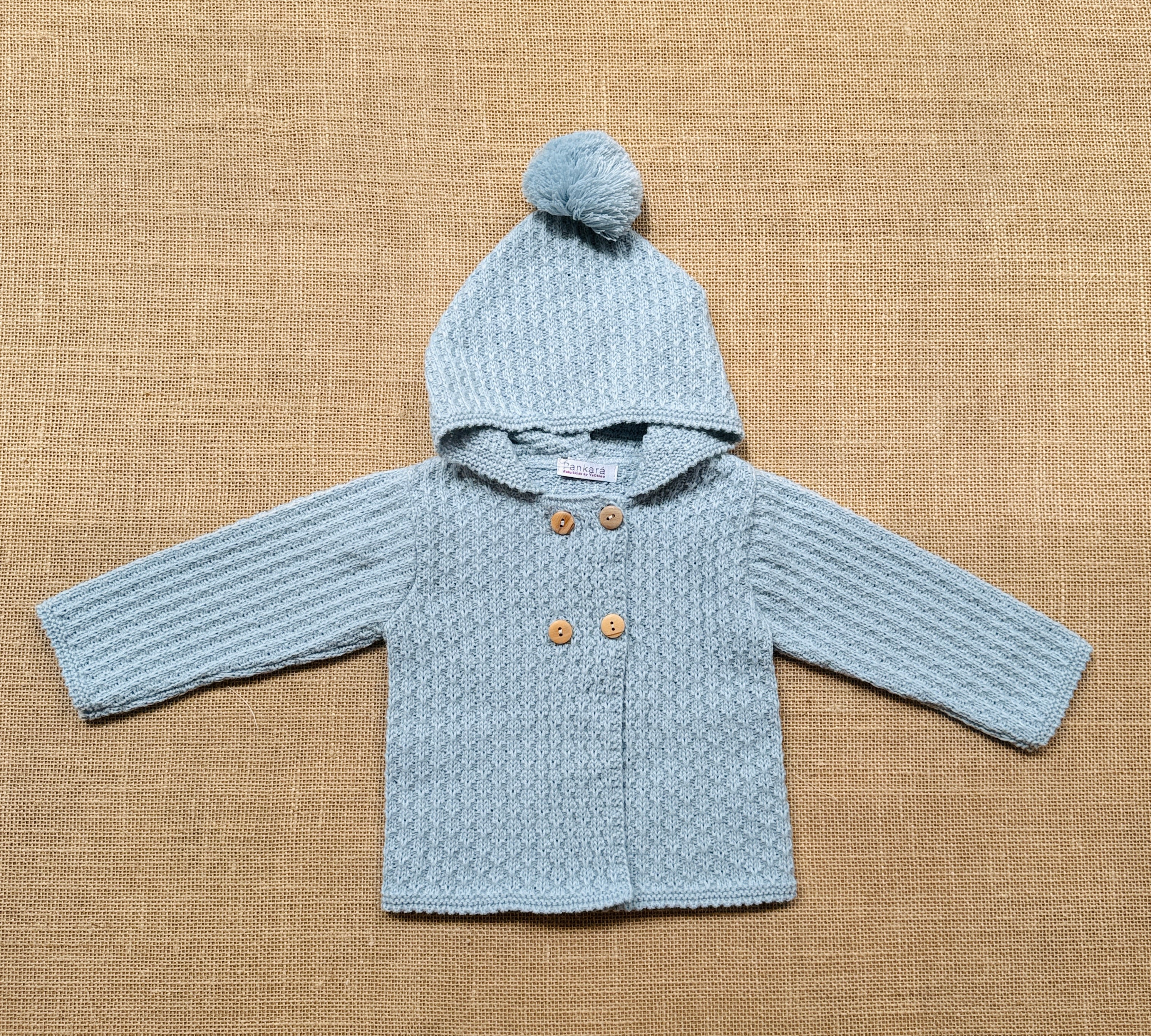 Chaqueta punto con capucha azul
