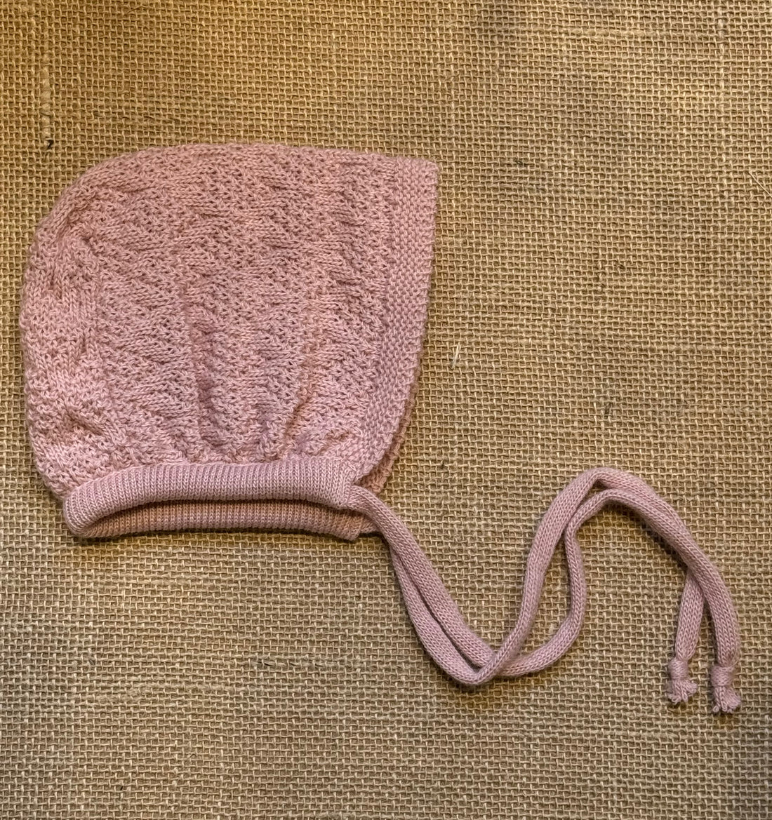 Capota de punto rosa