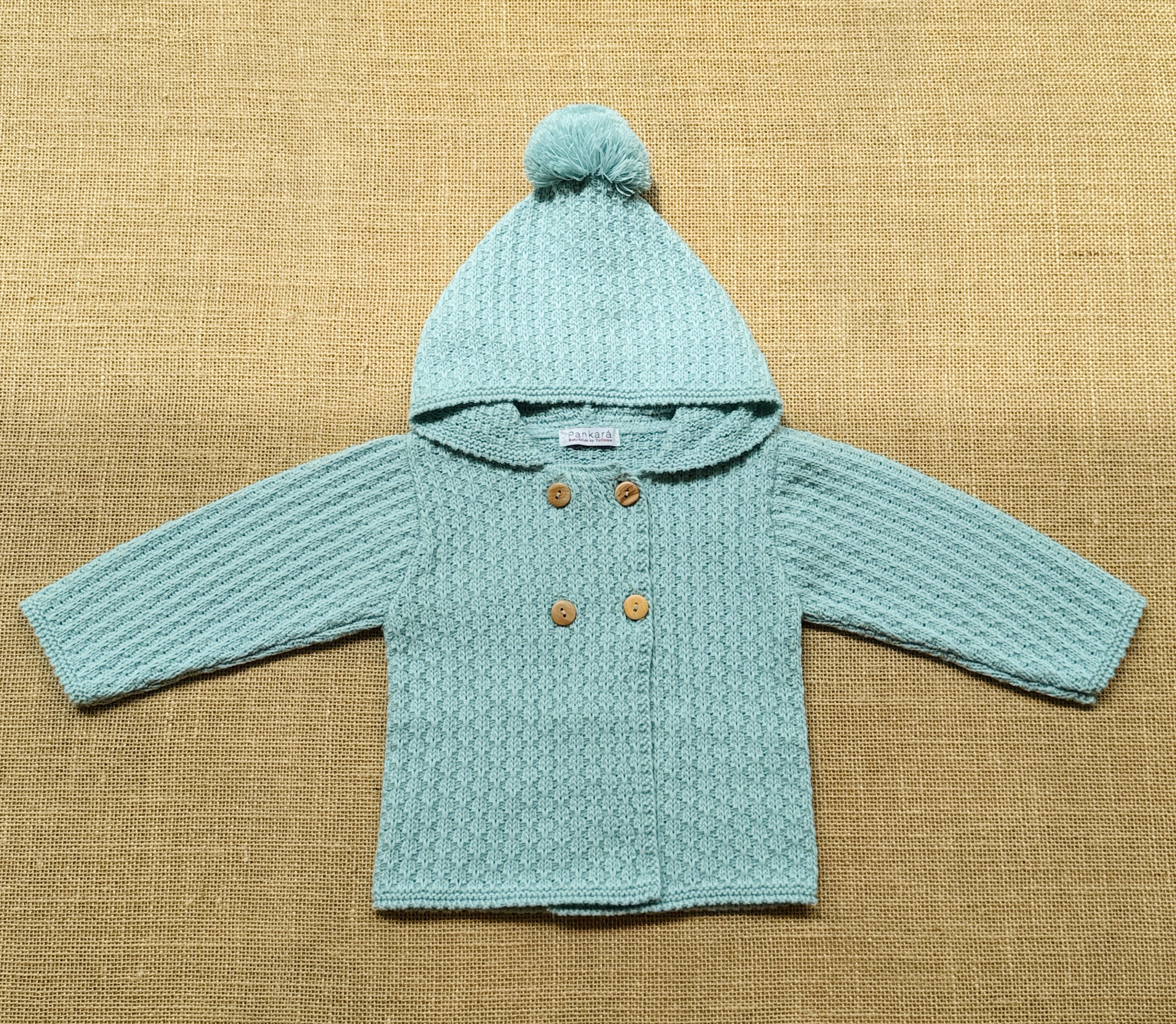 Chaqueta punto con capucha verde