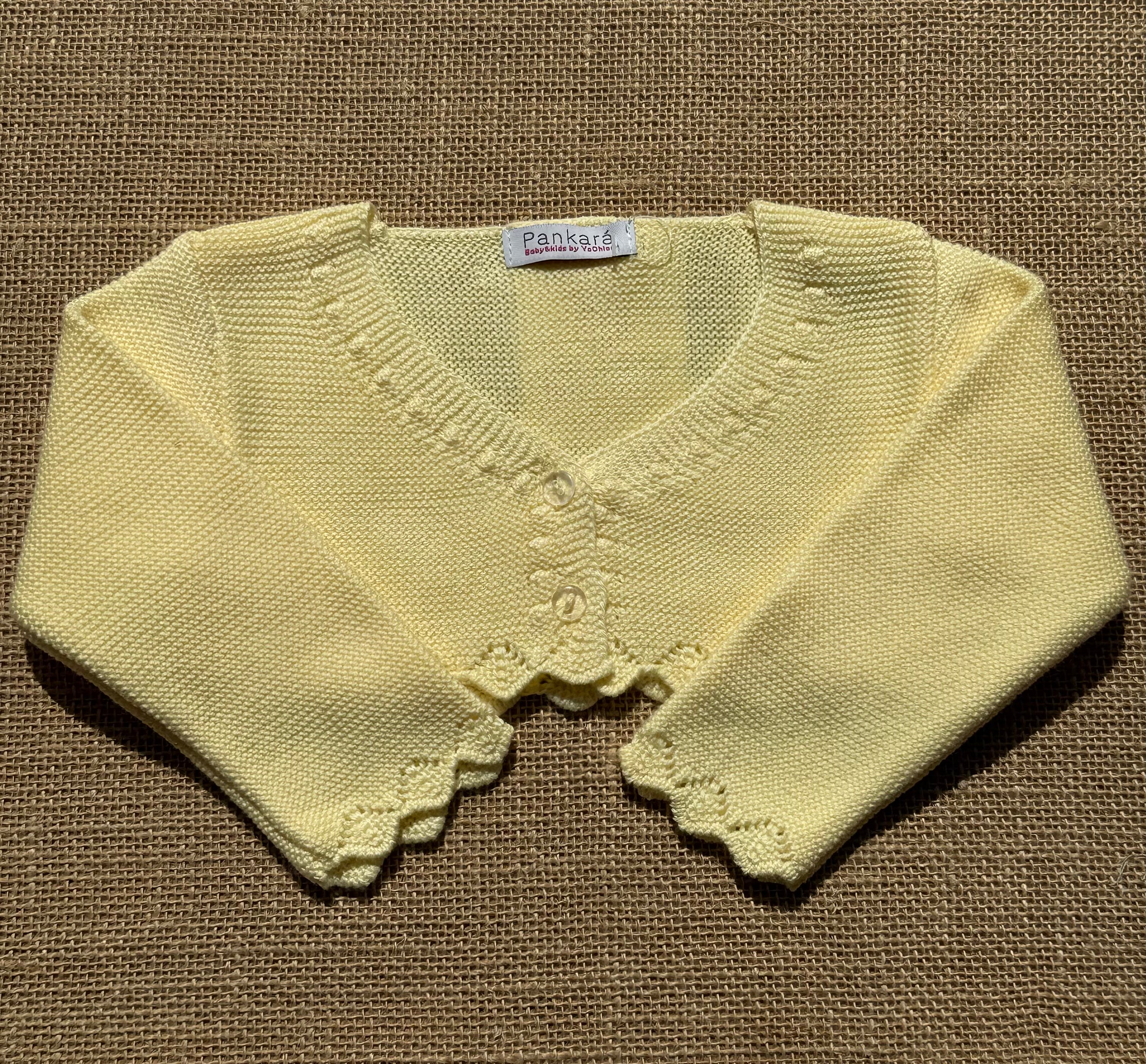 Chaqueta tipo bolero de punto