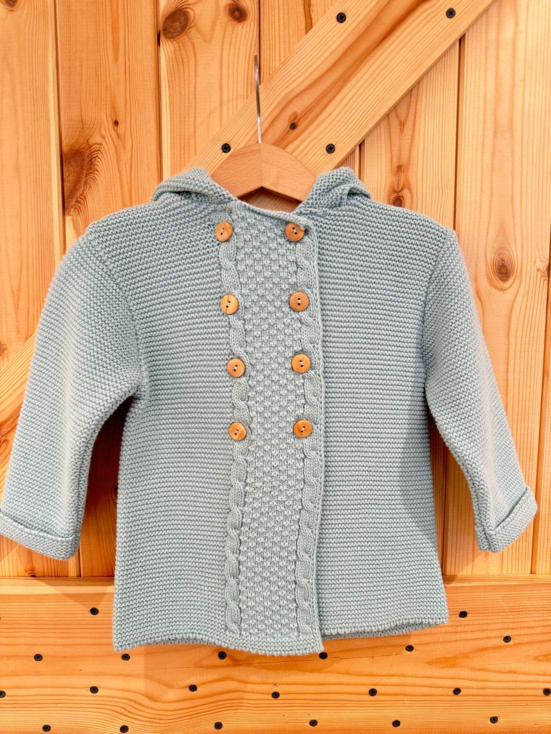 Chaqueta capucha pompón verde