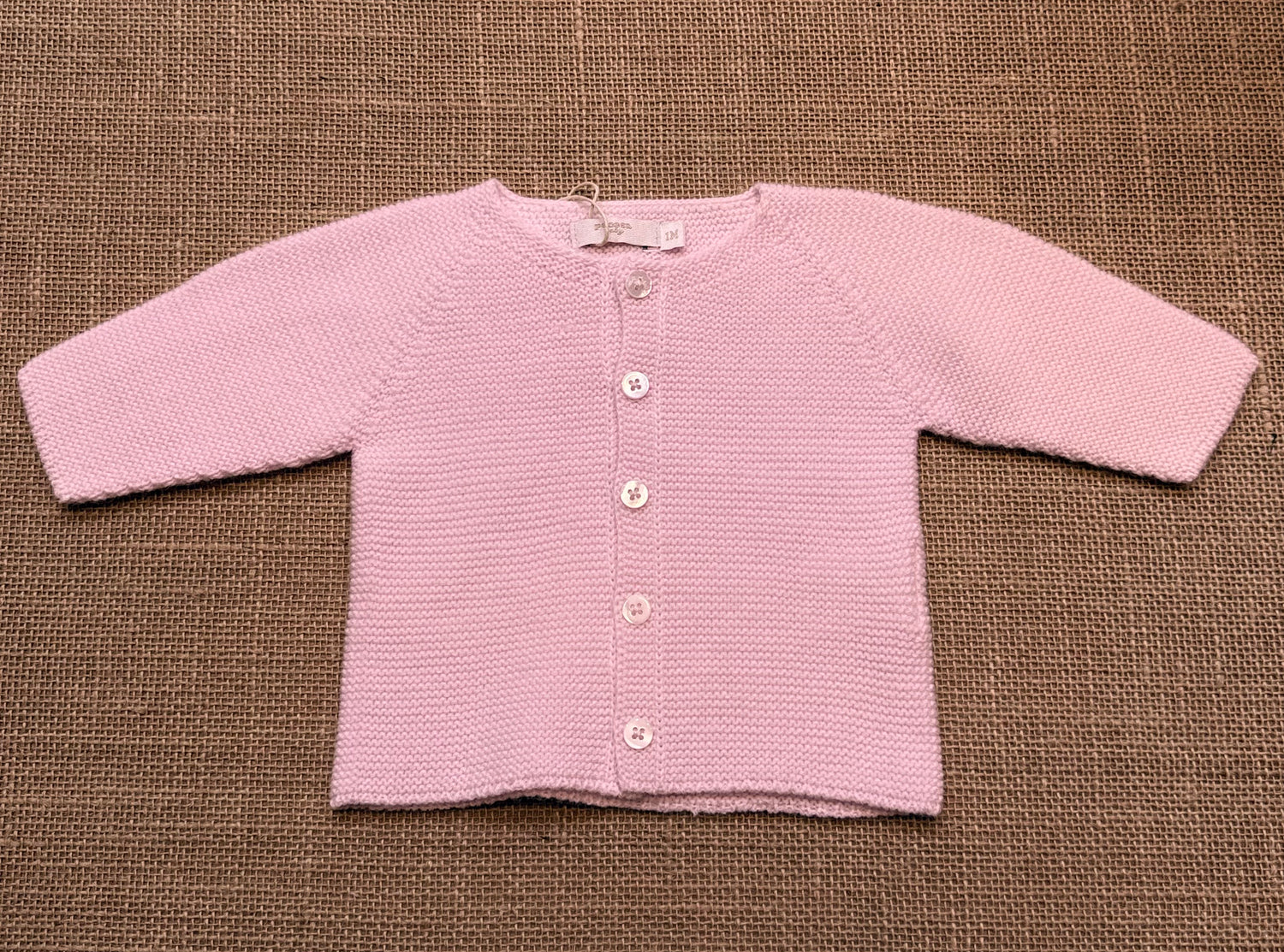 Chaqueta punto rosa bebé