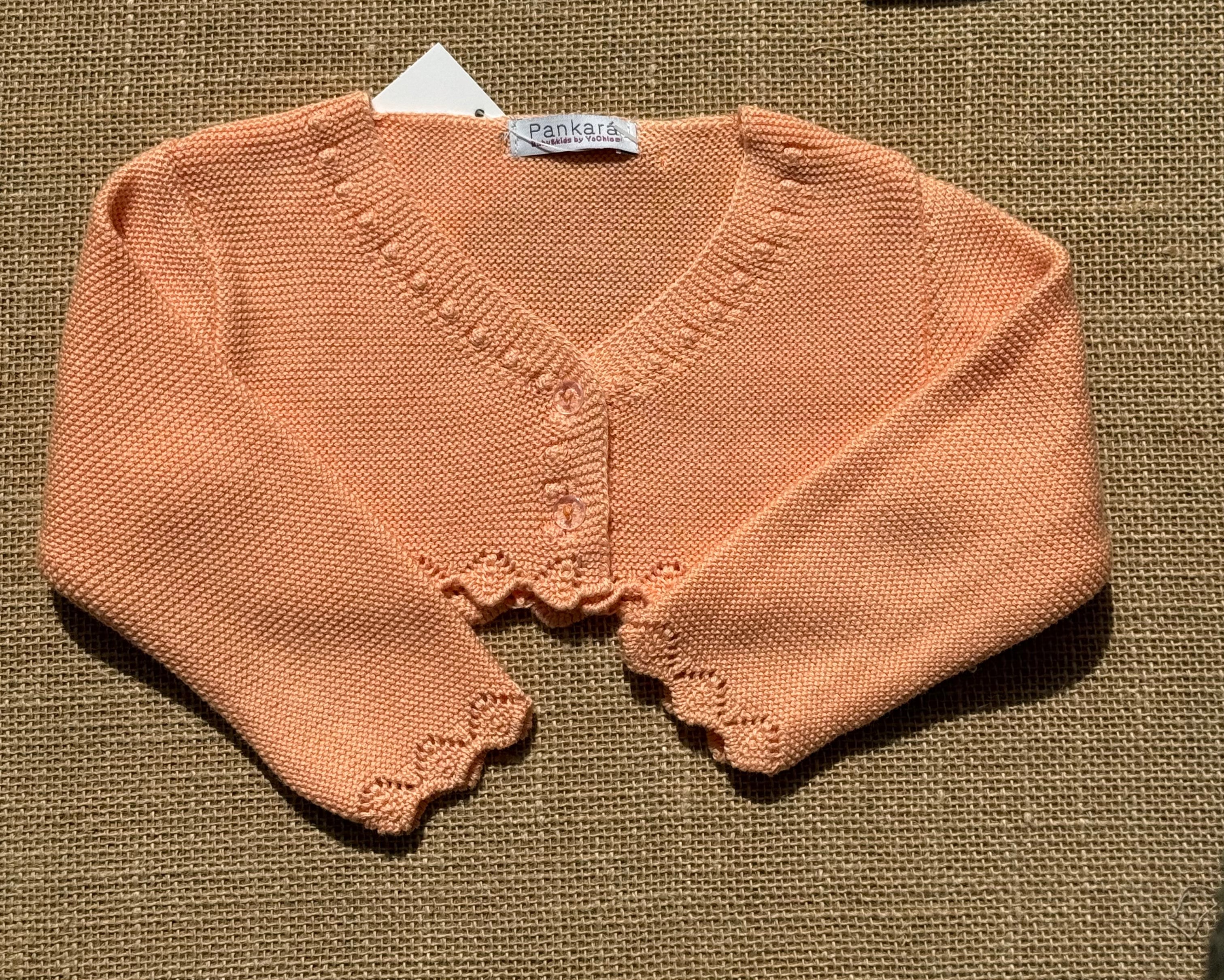 Chaqueta tipo bolero de punto