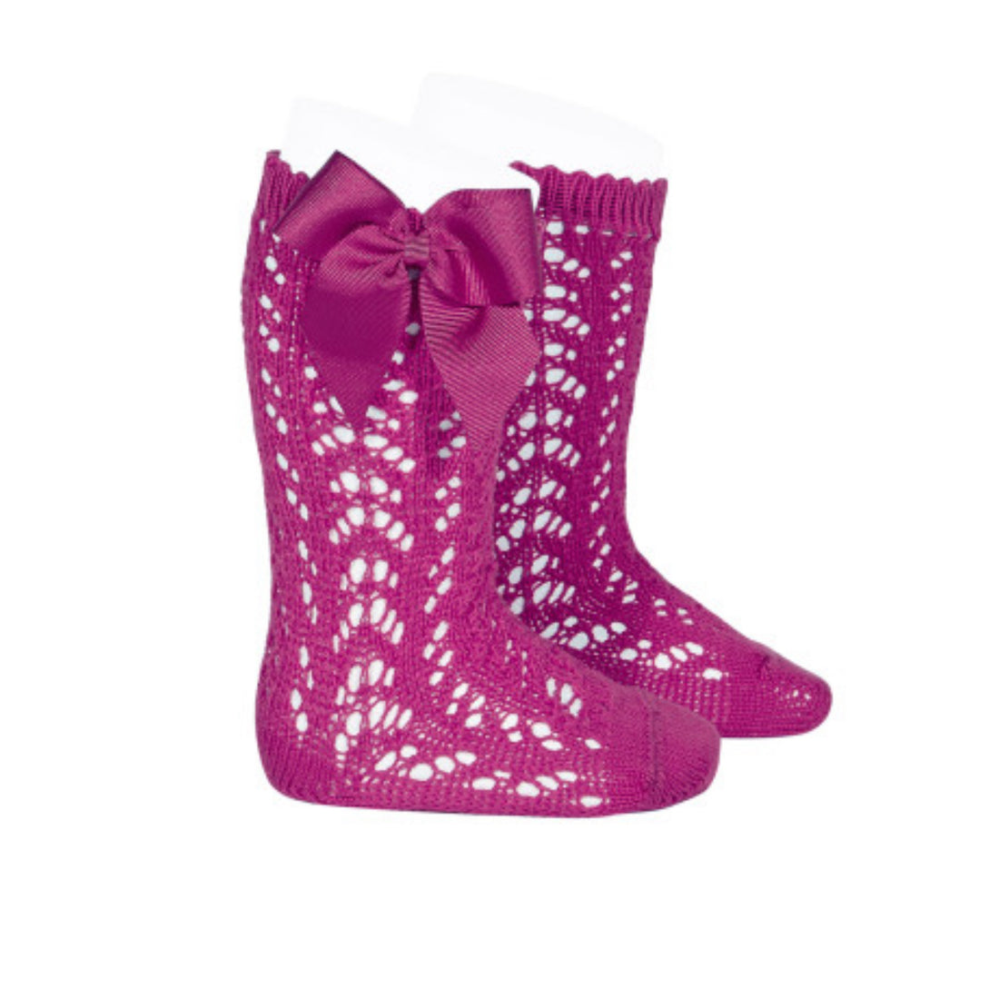 Calcetines altos perlé calados con lazo grogrén FUCSIA