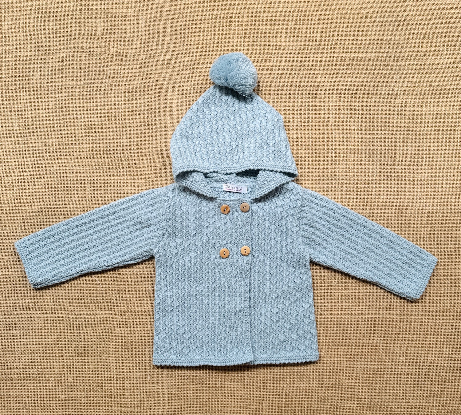 Chaqueta punto con capucha azul