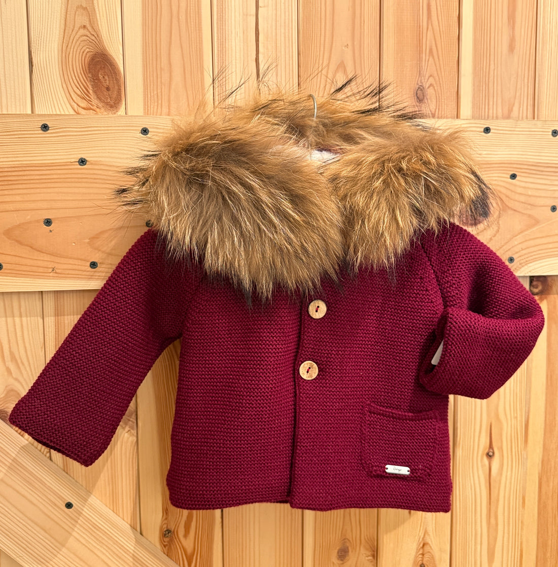 Abrigo forrado con pelo natural granate