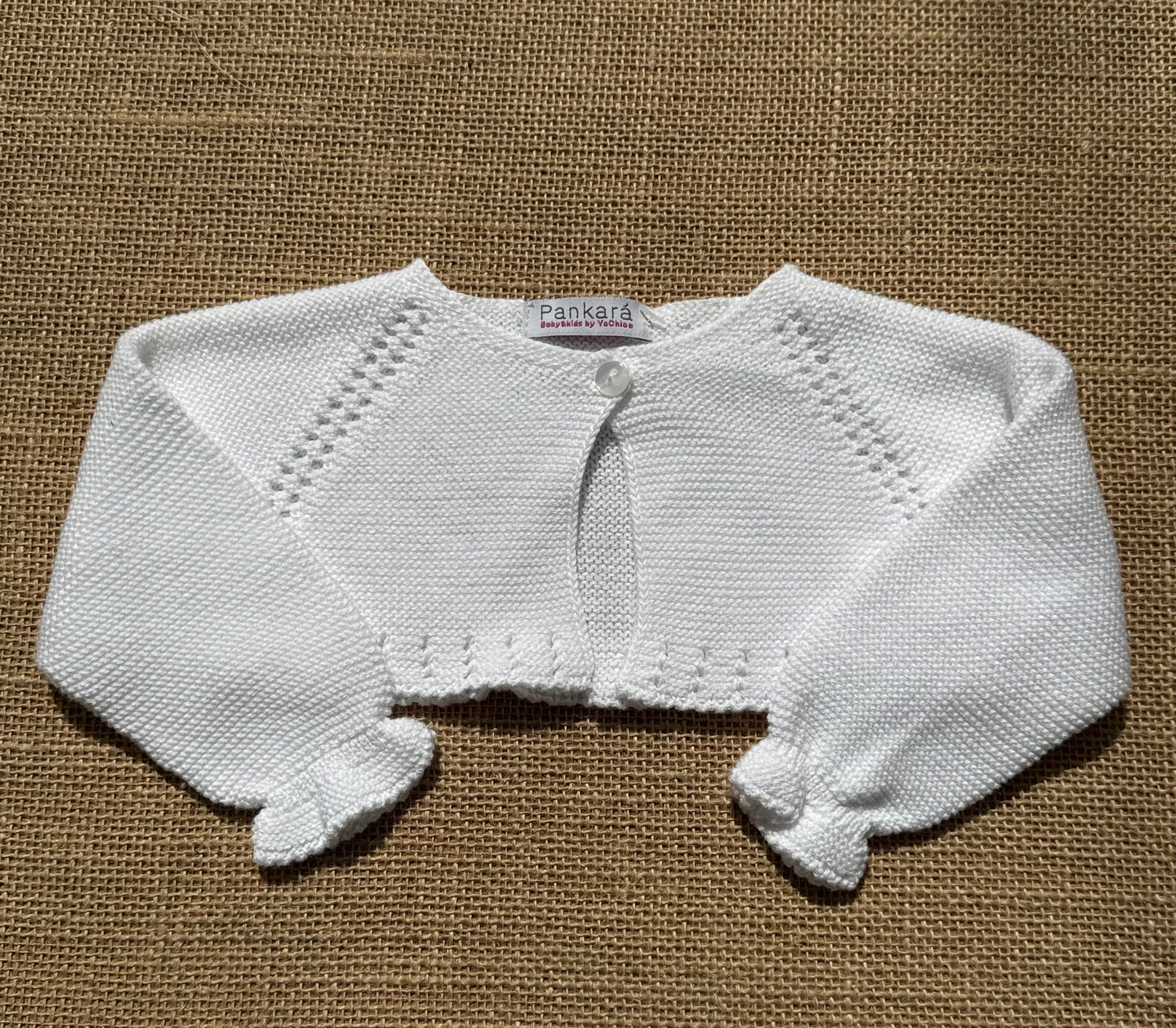 Chaqueta tipo bolero de punto