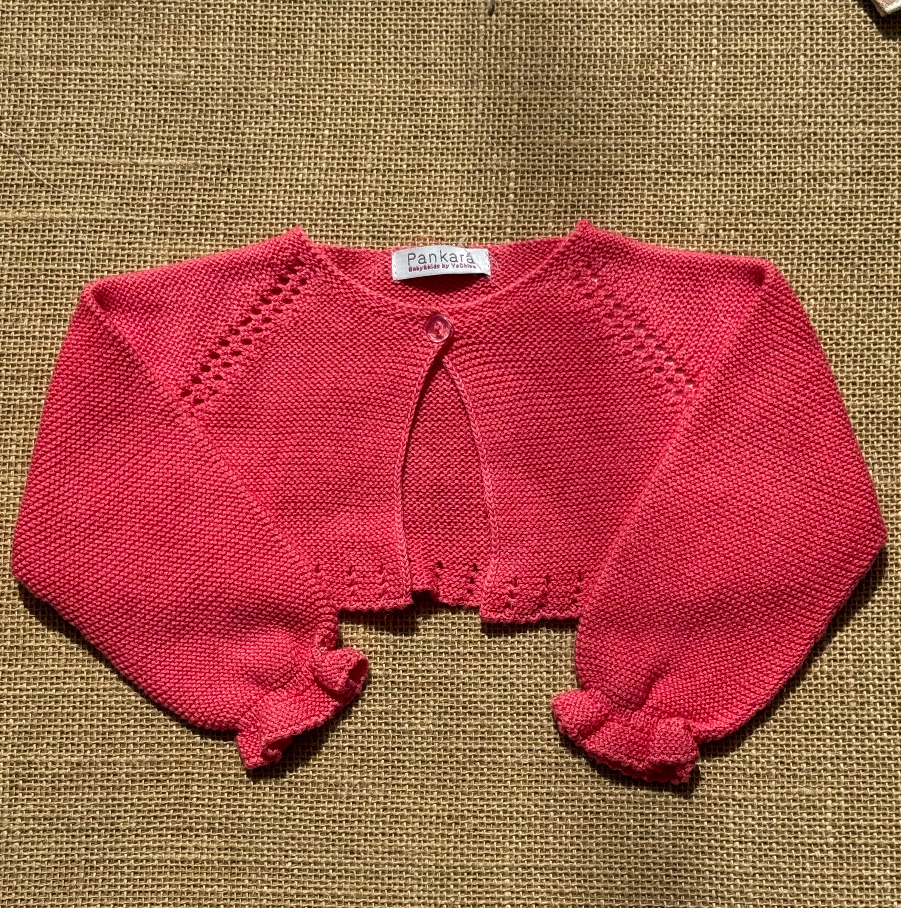 Chaqueta tipo bolero de punto