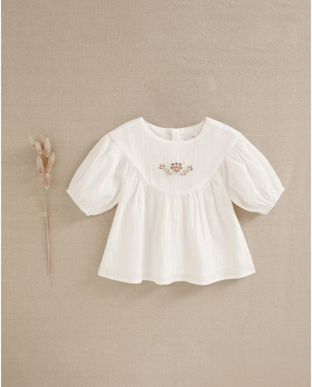BLUSA DE NIÑA BLANCA CON BORDADO ROSA EMPOLVADO