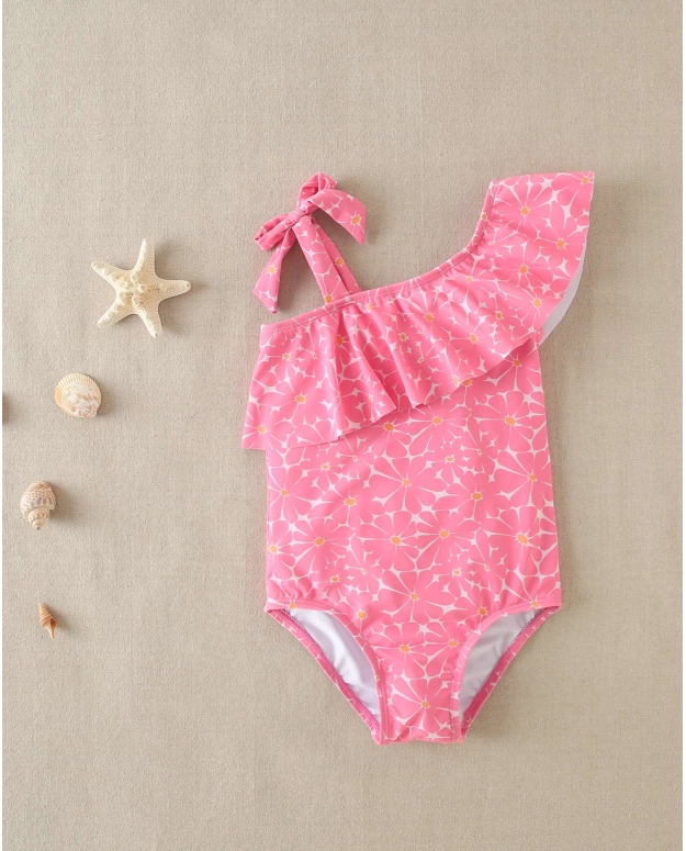 BAÑADOR DE NIÑA DE FLORES ROSA ASIMÉTRICO CON TIRANTE CON VOLANTE
