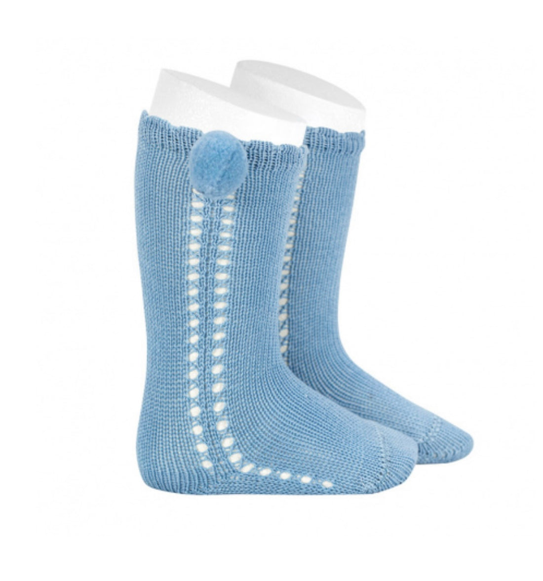 CALCETINES ALTOS PERLÉ CALADO CON POMPON LATERAL AZULADO
